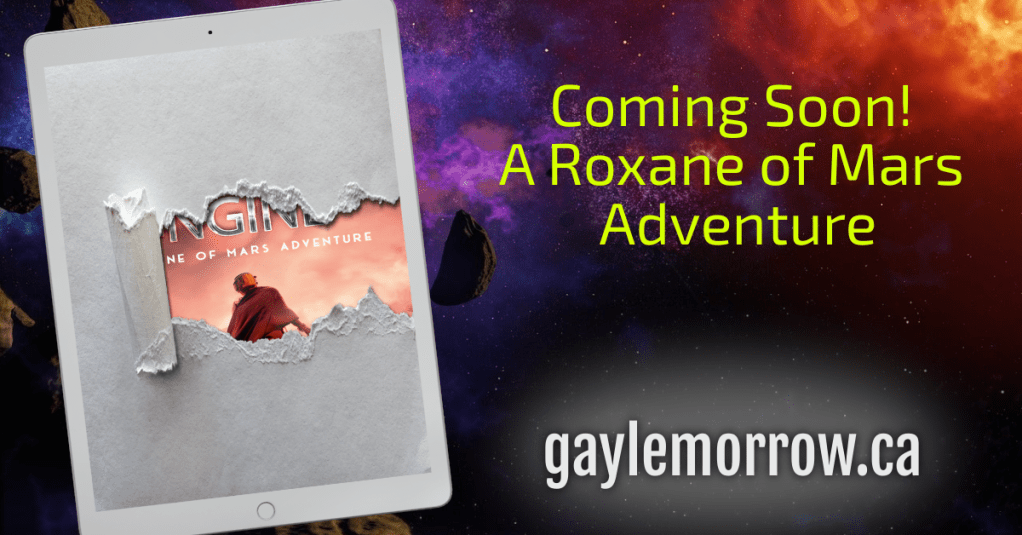 A tablet with ripped paper barely revealing the cover on a purple and orange nebula background. Green text reads: "Coming Soon! A Roxane of Mars Adventure." Below that is the url "gaylemorrow.ca"